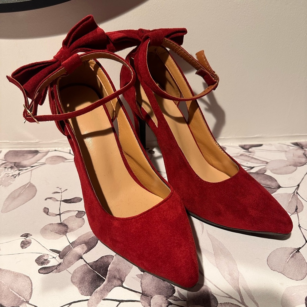 Red suede high heels